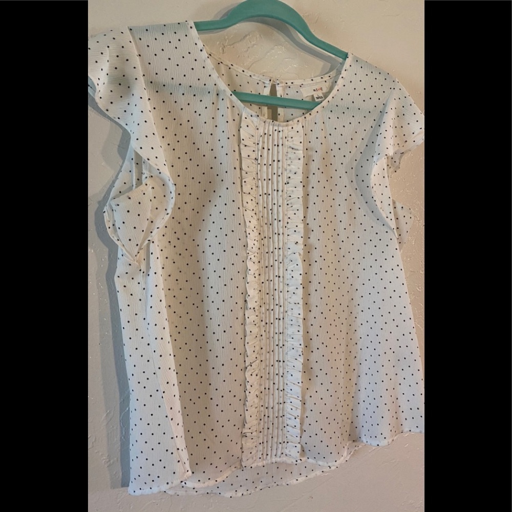 White blouse with black polka dots